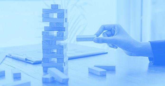 Placing a Jenga block in a tower about to collapse